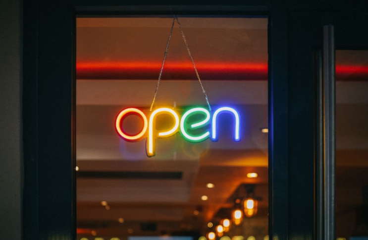Neon colored "Open" sign
